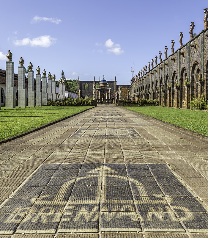 RECIFE, BRAZIL - MARCH 10: View of the unique Francisco Brennand Ceramic Factory in Recife, PE, Brazil showcasing its tile-covered pathway decorated with lots of ceramic sculptures on March 10, 2014.